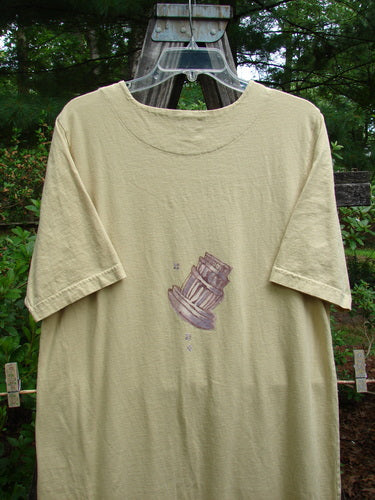 1999 Straight Dress Sugar Bowl Plantain Altered Size 1 featuring organic cotton, rounded neckline, side entry pockets, widening hips, and vented hemline. Seamless front with Sugar Bowl theme paint and Blue Fish patch.