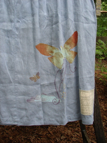 1999 Handkerchief Linen Blossom Skirt Butterfly Water Size 1 showcases a blue skirt with a butterfly design, featuring a full elastic waistline and a gradual widening shape, perfect for summer.