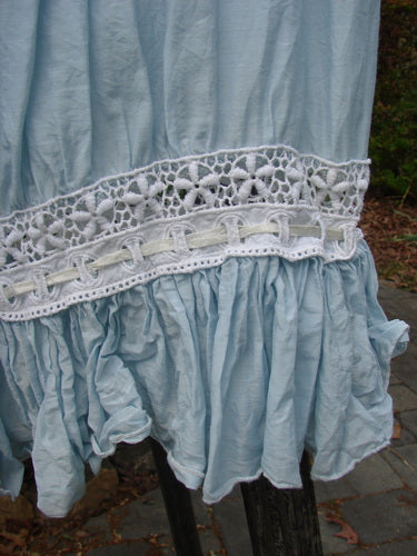 Magnolia Pearl Silk Voile Window Lace Ruffle Pocket Bloomer Sky OSFA, featuring a pale-blue gathered hem with white crochet lace and a ruffled flounce, showcasing unique dual window lacings and signature details.
