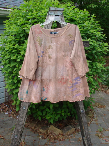 Barclay Three Quarter Sleeved Cafe Tee Freedom Forest Garden Beige Size 0, displayed on a wooden step ladder, features a flared hem with scalloped edges and subtle motifs, embodying Bluefishfinder.com's vintage style.