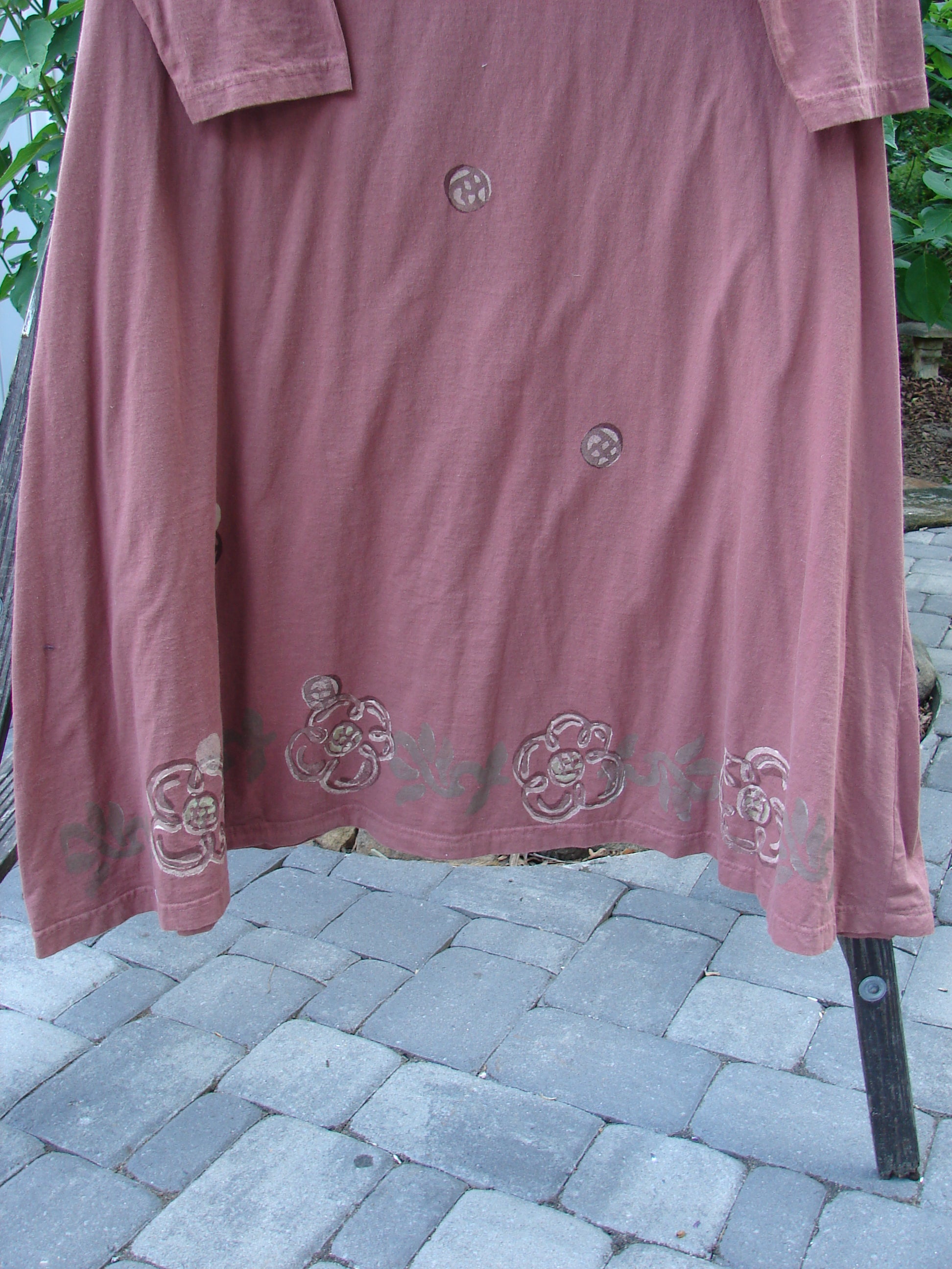 1995 Omega Dress Celestial Garden Altered Clove Size 1 displayed on a clothes rack, highlighting its heavy ribbed turtleneck, drop shoulders, and A-line flare with a drawcord backline.