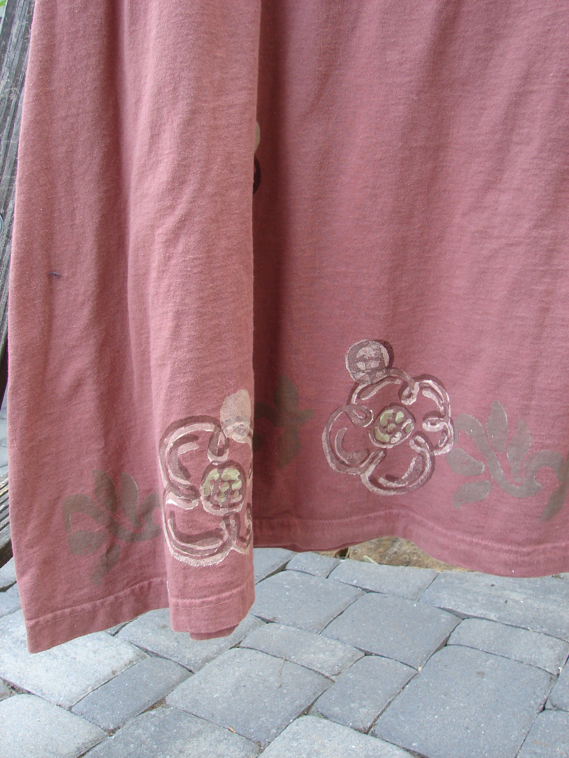 Close-up of the 1995 Omega Dress Celestial Garden Altered Clove Size 1, highlighting the intricate flower design on the organic cotton fabric and the heavy ribbed turtleneck.