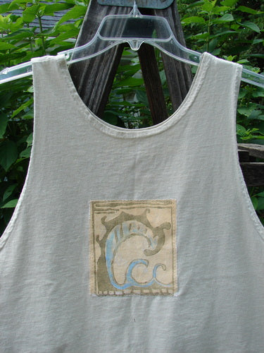 1999 PMU Patched Tank Top Wave Natural Size 1, showcasing a wide, slightly longer boxy shape with a colorful wave theme patch and Blue Fish patch, perfect for hot summer days.