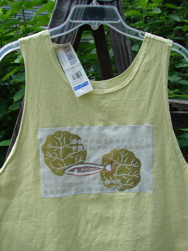 1999 NWT PMU Patched Tank Top Citron Size 0 featuring a scooped neckline, colorful fish theme patch, and signature blue fish patch, displayed on a clear plastic hanger.
