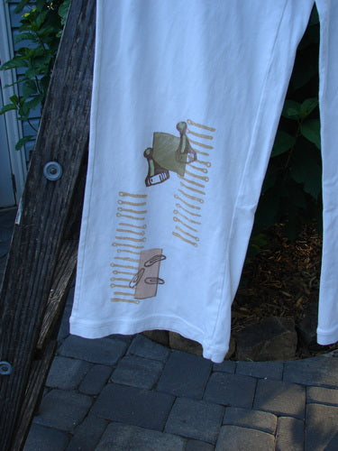 2001 Cotton Lycra Matchstick Pant Junk Drawer Fizz Size 1 featuring a thin waistband, wide bottoms, and a unique painted design, showcasing a slimming, pockless style from Bluefishfinder.com's vintage collection.