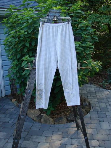 2000 Slim Pant Biology Dove Stripe Size 1 displayed on a clothes rack, featuring full elastic waistline and super thin stripes from the Resort Collection 2000, BlueFishFinder.com.