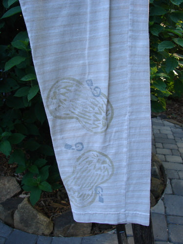 2000 Slim Pant Biology Dove Stripe Size 1 featuring full elastic waistline, fun bottom paint, and super thin stripes, laid on a towel with a light bulb design.