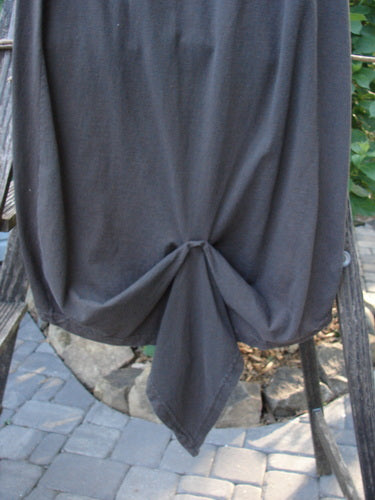1994 Harvest Gather Skirt Unpainted Bark Size 1 displayed draped over a chair, highlighting its sectional panels and full elastic waistband.