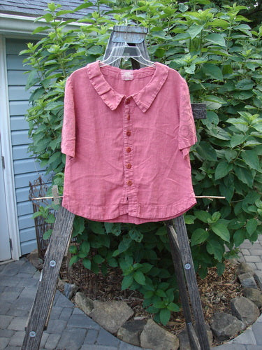 2001 Linen Banded Bottom Collar Top Celtic Heart Glow Size 1 displayed on a wooden ladder, showcasing its oversized sailor collar, full button front, and rounded banded bottom hem.