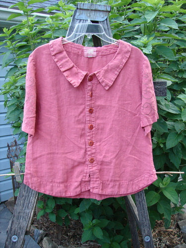 2001 Linen Banded Bottom Collar Top Celtic Heart Glow Size 1 displayed on a clothes rack, showcasing its oversized sailor collar, full button front, and painted Celtic Heart themed sleeves.