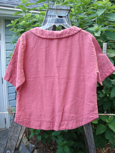 2001 Linen Banded Bottom Collar Top Celtic Heart Glow Size 1 hanging on a clothesline, showcasing its oversized sailor collar, full button front, and rounded banded bottom hem.
