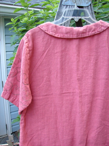 2001 Linen Banded Bottom Collar Top Celtic Heart Glow Size 1: A pink medium-weight linen shirt with an oversized sailor collar, full button front, banded hem, and hand-painted Celtic Heart design.