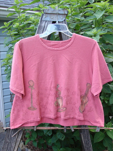 2000 Short Sleeved Crop Tee Star Music Time Coral Size 1 featuring playful music-themed drawings, wide short sleeves, and a softly rolled neckline, from Bluefishfinder.com’s Summer Collection, crafted from organic cotton.