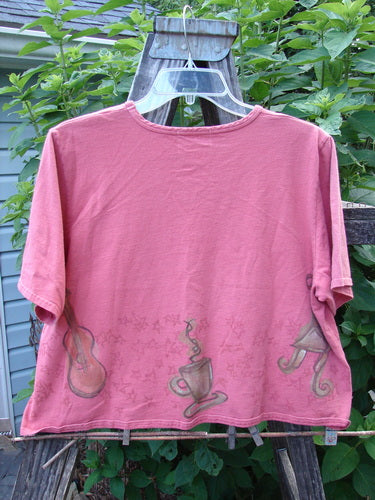 2000 Short Sleeved Crop Tee Star Music Time Coral Size 1 featuring playful coffee cup drawings, wide short sleeves, and a softly rolled neckline, made from organic cotton in excellent condition.
