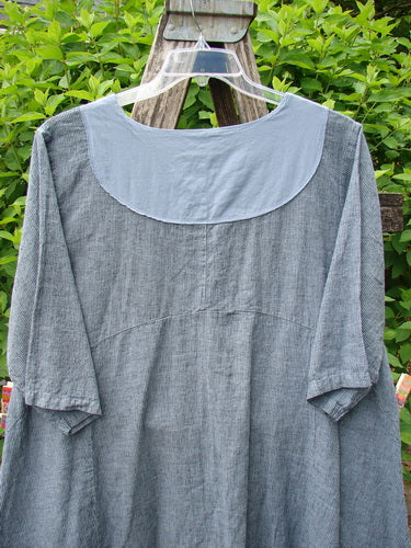 Barclay NWT Linen Cross Over Urchin Dress in Unpainted Stripe Sky, featuring a loose-fitting, mid-calf length with elbow-length sleeves and a rounded bib, showcasing Bluefishfinder.com's vintage charm.