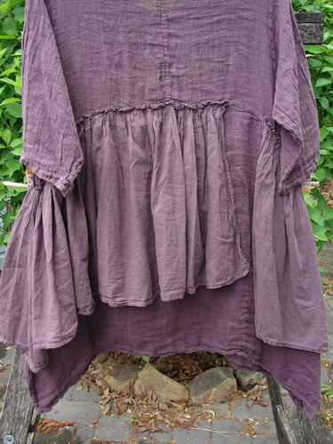 Barclay Gauze Batiste Petal Urchin Flounce Dress in unpainted fig size 1, featuring a loose-fitting bohemian style with a crinkled fabric, empire gathered flounce, and three-quarter sleeves.