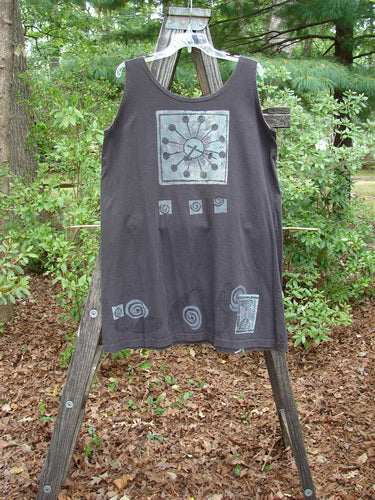 1995 Sun Glint Tank Atom Briquette OSFA displayed on a wooden stand, featuring a scooped neckline and a unique atom theme paint, perfect for hot summer days.