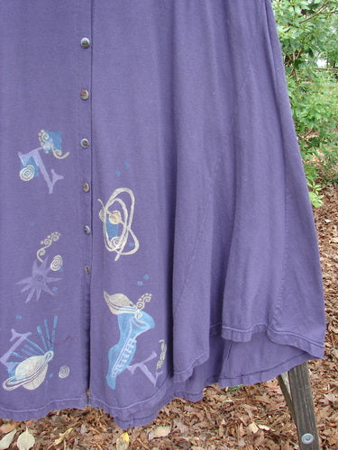 1994 Spin Jumper Mixed Purple Nuit Size 2 with a unique design, featuring side and back tie tunnels, a V-shaped neckline, and a sweeping hemline adorned with nature-inspired patterns.
