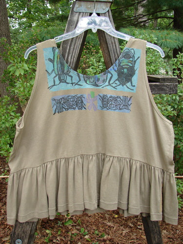 1992 Peplum Top Beetle Wheat OSFA, tan tank top with painted bug designs, displayed on a hanger. Features a wide waist, rounded neckline, and gathered bottom flounce.