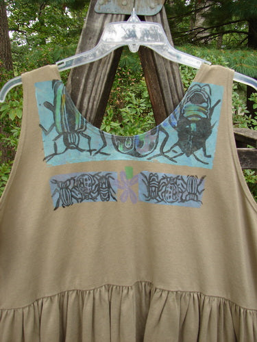 1992 Peplum Top Beetle Wheat OSFA featuring painted bugs, a downward yoked waist seam, rounded neckline, higher arm openings, and a gathered bottom flounce. Mid-weight cotton, baby doll style.