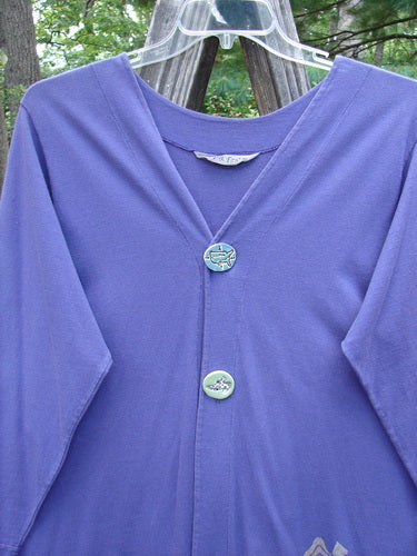 1996 Dining Car Jacket Travel Niagara Size 1 displayed on a wooden hanger, featuring buttons, deep V-shaped neckline, and deep side pockets, crafted from mid-weight organic cotton.