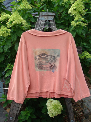 1994 Box Pocket Jacket Reef Harp Star Size 1 displayed on a wooden hanger, showcasing its unique collar, oversized front pockets, and signature blue buttons.