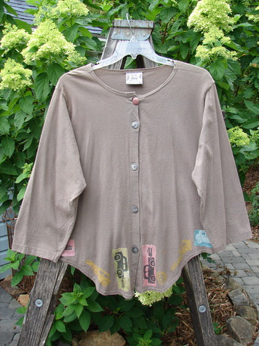 1993 Tie Back Jacket Car Bay Leaf OSFA displayed on a swinger, showcasing its unique antique car-themed paint, top vintage button, and original double drawcord back with metal grommets.