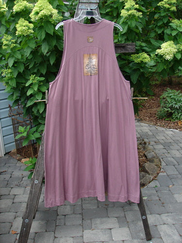 1996 State Fair Vest Pine Twig Laurel Size 1 displayed outdoors on a clothesline, showcasing its organic cotton fabric with a single oversized button and a pine twig theme.