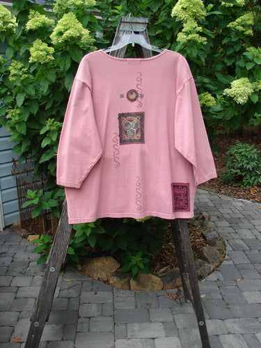 1996 Celtic Jacket of Picts Caille OSFA displayed on a swinger, featuring a Deep V neckline, tiny front snaps, and contrasting hem pockets with a signature patch and Celtic-themed paint.