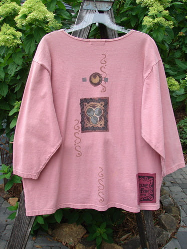 1996 Celtic Jacket of Picts Caille OSFA featuring a deep V-shaped neckline, numerous front snaps, contrasting fabric hem pockets, and a prominent rear blue fish signature patch.