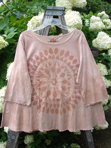 Bluefishfinder.com Barclay Three Quarter Sleeved Cafe Tee Giant Sunflower Mottled Pumpkin Size 1, a loose mottled pumpkin top with three-quarter sleeves and a faded giant sunflower print. The soft, lightweight fabric drapes in a relaxed A-line shape, with raw-edged hems and a muted blush-brown palette.