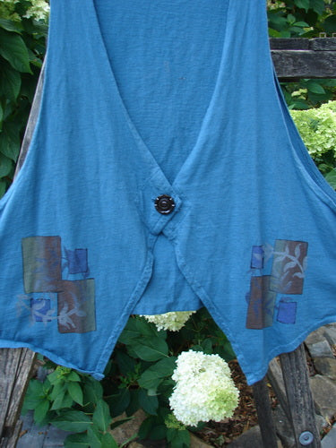 Barclay Calligrapher's Crop Vest Fern Window Blue Tealen Size 1 features a deep V-neckline, single button closure, dramatic front points, and a cropped back, showcasing an artistic fern window design.