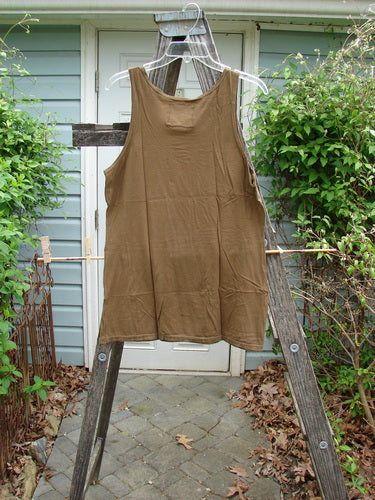 Barclay Lightweight Basic Tank Top Unpainted Bark Smaller Size 2, displayed neatly on a wooden ladder, showcasing its straight bodice and rounded neckline, perfect for layering in a vintage style.