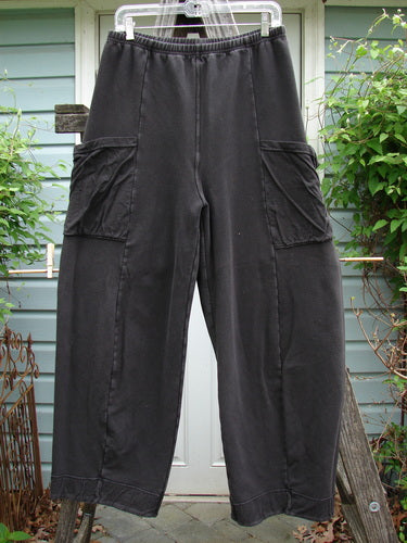 Barclay Interlock Cuff Toboggan Reversible Pant Unpainted Black Size 1, featuring a full elastic waist, fleece-cuffed lowers, oversized drop wrap side pockets, and vertical exterior stitchery. Ideal for versatile winter wear.
