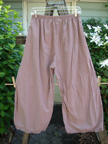 Barclay Batiste Tiny Flutter Pocketless Pant Unpainted Dark Mallow Size 0, featuring a sweet bottom flutter, full elastic waistline, and slightly widening lowers, designed for creative expression from Bluefishfinder.com.