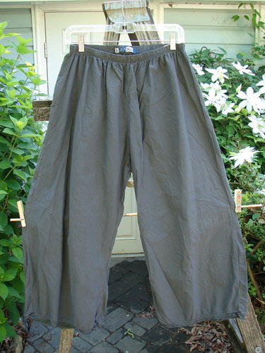 Barclay Batiste Tiny Flutter Pocketless Pant Unpainted Almost Black Size 0 features a unique sweet bottom flutter, full elastic waistline, and slightly widening lowers, embodying Bluefishfinder.com's vintage, creative style.