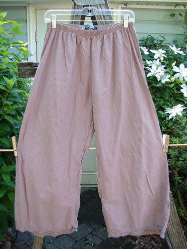 Barclay Batiste Tiny Flutter Pocketless Pant, Size 0, showcases a graceful, elongated silhouette with a unique flutter hem and full elastic waist, embodying Bluefishfinder.com's vintage, creative fashion ethos.