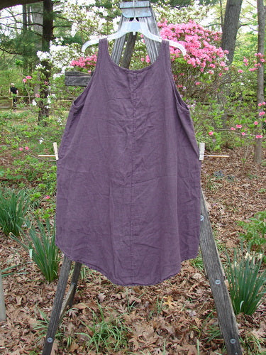 Barclay Linen Round Bottom Primitive Circle Murple Size 1 displayed on a wooden rack, highlighting its A-line shape and scoop neckline. Part of Bluefishfinder.com's vintage-inspired collection.