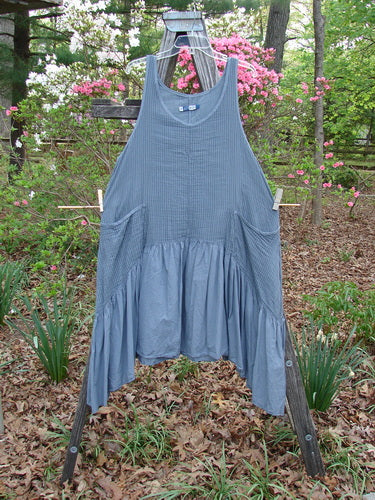 Barclay Gauze Dual Pocket Varano Jumper Unpainted Stripe Moss Size 0 displayed on a wooden frame, showcasing its oval neckline, deep arm openings, and distinct dual pockets.