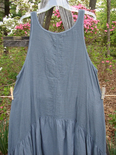 Barclay Gauze Dual Pocket Varano Jumper Unpainted Stripe Moss Size 0 hanging on a clothesline, showcasing its unique medium weight gauze fabric and deep pockets, embodying BlueFishFinder's vintage elegance.