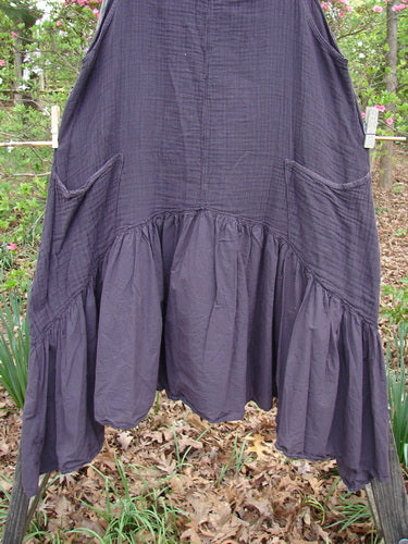 Barclay Gauze Dual Pocket Varano Jumper Unpainted Plum Size 0, displayed hanging, features a textured upper bodice, flounce skirt, deep pockets, and oval neckline, showcasing distinct BlueFishFinder vintage style.