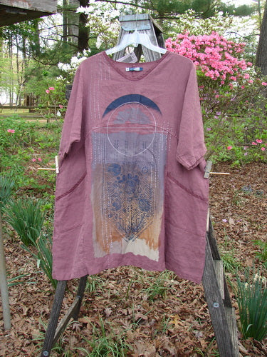 Barclay NWT Heavy Linen Oversized Zen Pocket Dress Centered Rose Canyon Size 0 displayed on a hanger outdoors, featuring dual drop pockets, A-line shape, and sectional panels, perfect for vintage-inspired styling.