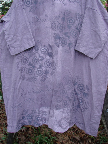 Barclay Linen Oversized Canyon Dress Floral Garden Lilac OSFA features a floral design on medium-weight linen, rounded neckline, drop shoulders, and three-quarter dolman sleeves, embodying BlueFishFinder's vintage, expressive style.