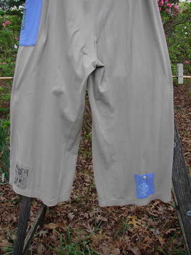 1997 Cubist Pant Top Hat Wheat Altered Size 1 features oversized patches and a drawstring waist, embodying a vintage Blue Fish style with unique buttons and a wide-leg silhouette.