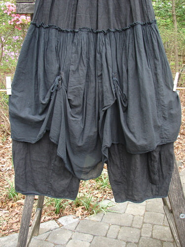 Barclay Linen Batiste Fusion Pant Skirt Galaxy Black Size 0 features a layered design with dual ties and a billowy shape, showcasing unique triangular patches and sectional panels.
