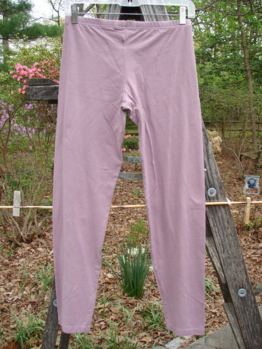 Barclay Cotton Lycra Crop Lightweight Legging Unpainted Lilac Size 0 displayed on a wooden ladder, showcasing a full thinner elastic waistband and tapering lowers, embodying BlueFishFinder's vintage, expressive style.