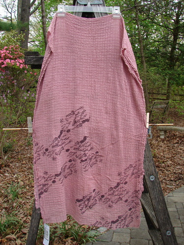 Barclay NWT Crinkle Cotton Scarf Wheat Field Plum Rose OSFA displayed on a wooden ladder, showcasing its soft texture and unique wheat field pattern, perfect for versatile styling.