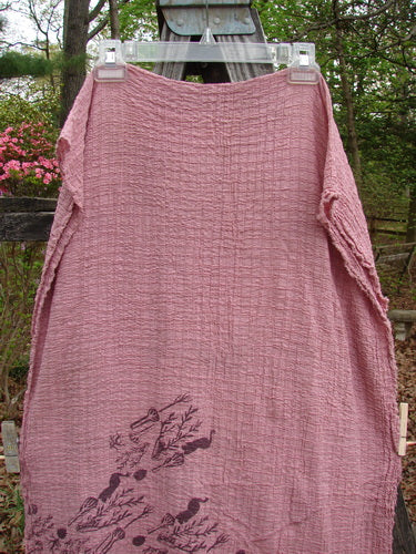 Barclay NWT Crinkle Cotton Scarf Wheat Field Plum Rose OSFA displayed on a clothesline, showcasing its soft texture and wheat field pattern, ideal for versatile styling as a shawl or wrap.