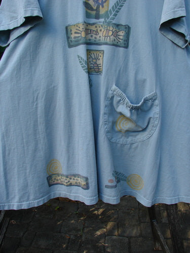 1995 Hop Scotch Dress Garden Friends Beach Glass Size 2 displayed outdoors, showcasing its oversized A-line shape and abstract prints with an elastic-topped pocket, capturing BlueFishFinder.com's unique vintage appeal.