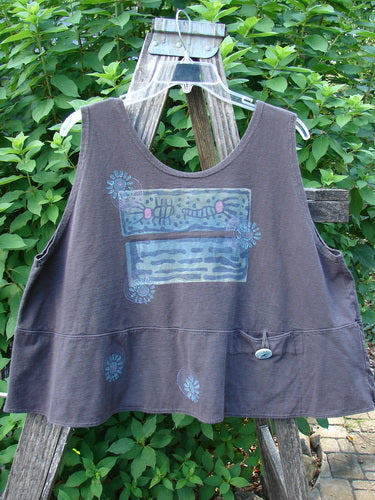1995 Klee Top Garden Friends Shadow Size 1: Sleeveless, boxy-cut tunic with a stylized graphic and buttoned pocket, hanging from a ladder against a lush hedge, embodying BlueFishFinder's vintage, artistic fashion ethos.